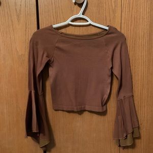 Light brown shirt with flared sleeves